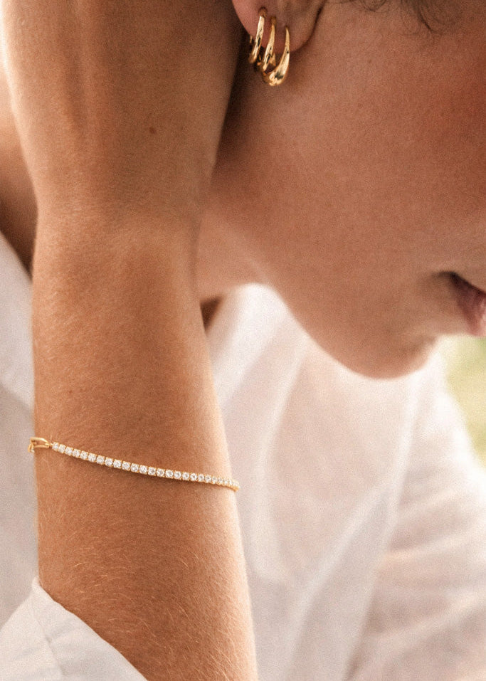 neptune armband goldene creolen mobijou