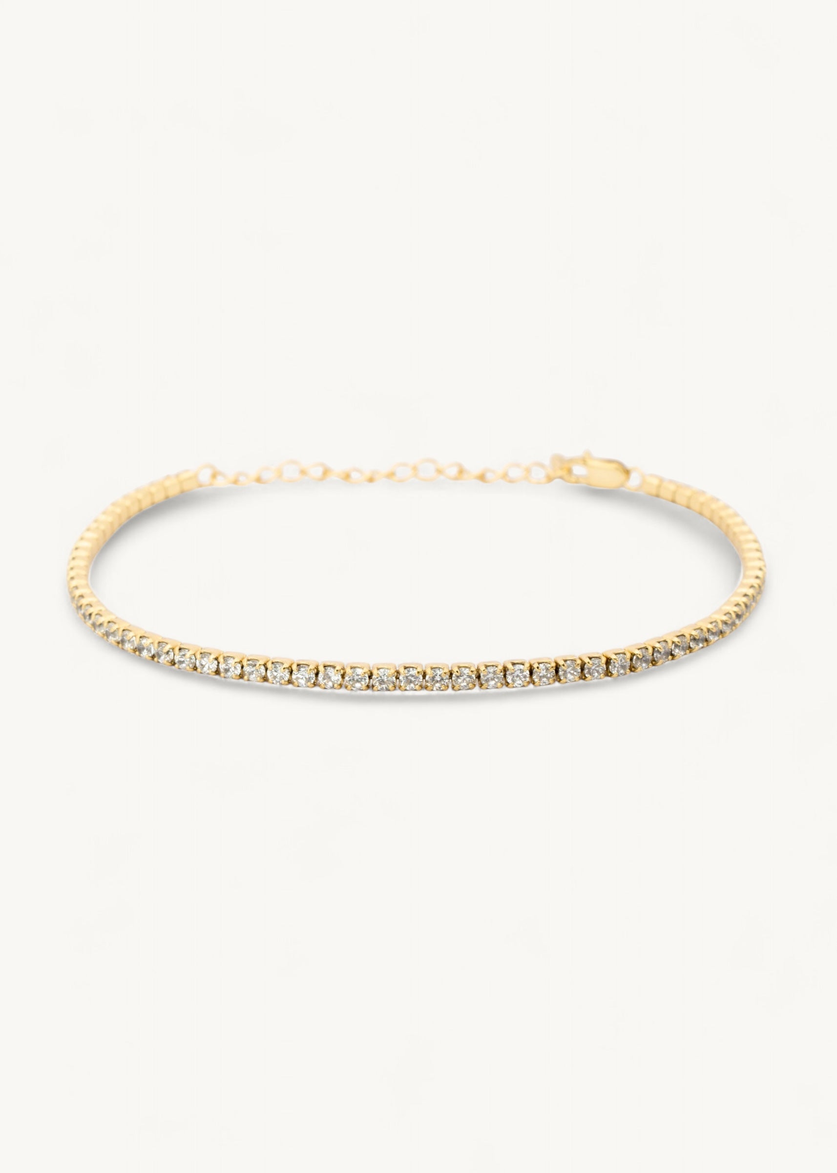 Muse Armband 18 Karat vergoldeter Tennis Armband besetzt mit Zirkonia Steinen aus 925 Sterlingsilber der Marke Mobijou